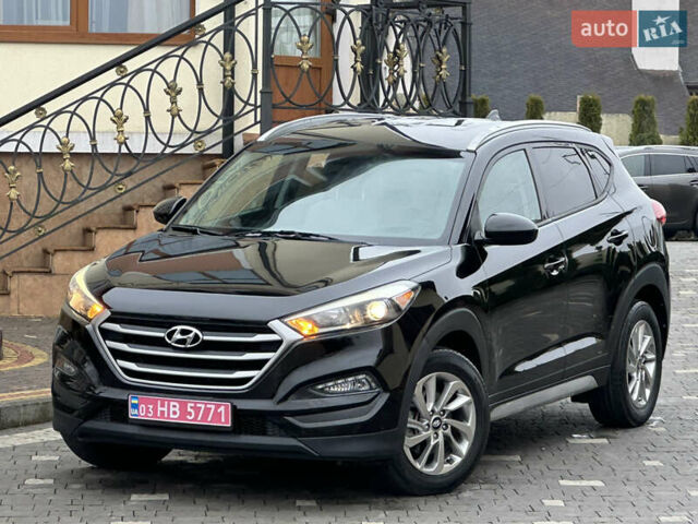 Черный Хендай Туксон, объемом двигателя 2 л и пробегом 156 тыс. км за 12800 $, фото 5 на Automoto.ua