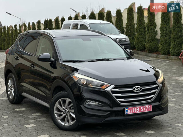 Черный Хендай Туксон, объемом двигателя 2 л и пробегом 156 тыс. км за 12800 $, фото 41 на Automoto.ua