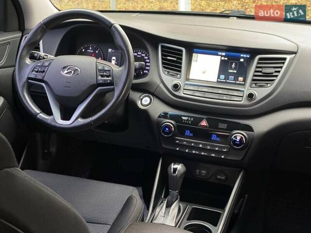 Черный Хендай Туксон, объемом двигателя 2 л и пробегом 106 тыс. км за 19500 $, фото 14 на Automoto.ua