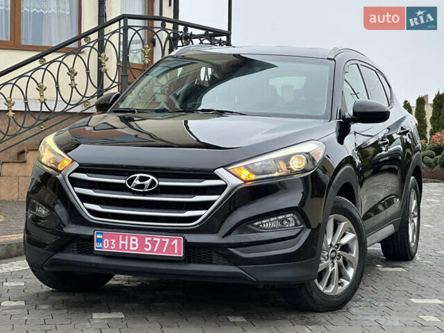 Черный Хендай Туксон, объемом двигателя 2 л и пробегом 156 тыс. км за 12800 $, фото 8 на Automoto.ua