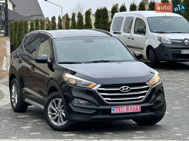 Черный Хендай Туксон, объемом двигателя 2 л и пробегом 156 тыс. км за 12800 $, фото 39 на Automoto.ua