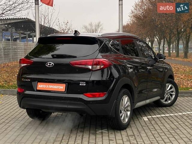 Черный Хендай Туксон, объемом двигателя 2 л и пробегом 106 тыс. км за 19500 $, фото 5 на Automoto.ua