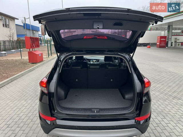 Черный Хендай Туксон, объемом двигателя 1.69 л и пробегом 134 тыс. км за 21800 $, фото 37 на Automoto.ua