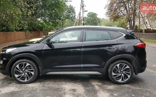 Чорний Хендай Туксон, об'ємом двигуна 2 л та пробігом 91 тис. км за 25000 $, фото 2 на Automoto.ua