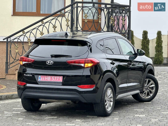 Черный Хендай Туксон, объемом двигателя 2 л и пробегом 156 тыс. км за 12800 $, фото 48 на Automoto.ua
