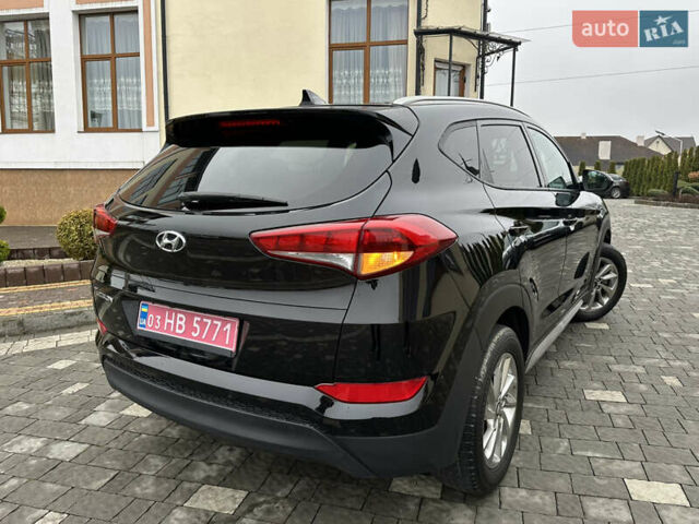 Черный Хендай Туксон, объемом двигателя 2 л и пробегом 156 тыс. км за 12800 $, фото 60 на Automoto.ua