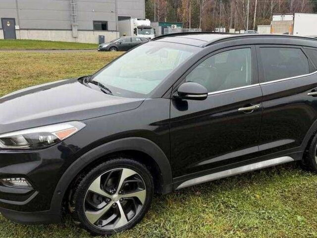 Черный Хендай Туксон, объемом двигателя 1.6 л и пробегом 65 тыс. км за 12600 $, фото 5 на Automoto.ua