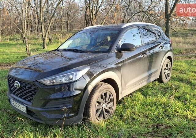 Черный Хендай Туксон, объемом двигателя 2 л и пробегом 101 тыс. км за 19700 $, фото 1 на Automoto.ua