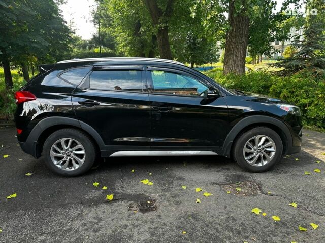 Черный Хендай Туксон, объемом двигателя 2 л и пробегом 109 тыс. км за 18490 $, фото 3 на Automoto.ua