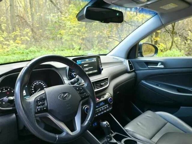 Чорний Хендай Туксон, об'ємом двигуна 2 л та пробігом 135 тис. км за 13500 $, фото 8 на Automoto.ua