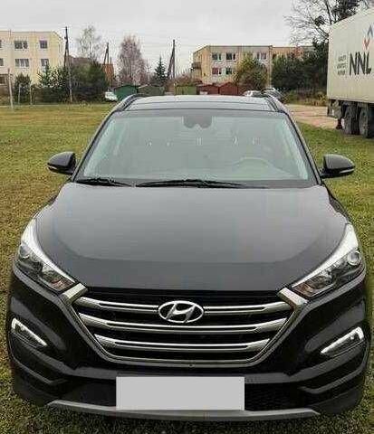 Черный Хендай Туксон, объемом двигателя 1.6 л и пробегом 65 тыс. км за 12600 $, фото 2 на Automoto.ua