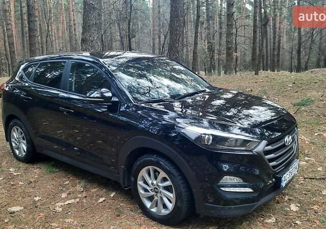 Черный Хендай Туксон, объемом двигателя 2 л и пробегом 100 тыс. км за 17200 $, фото 2 на Automoto.ua
