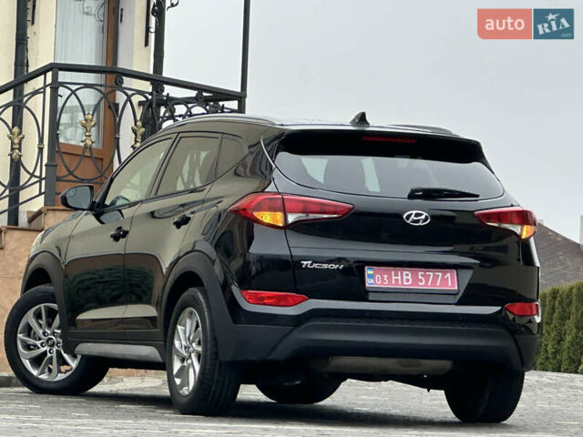 Черный Хендай Туксон, объемом двигателя 2 л и пробегом 156 тыс. км за 12800 $, фото 18 на Automoto.ua
