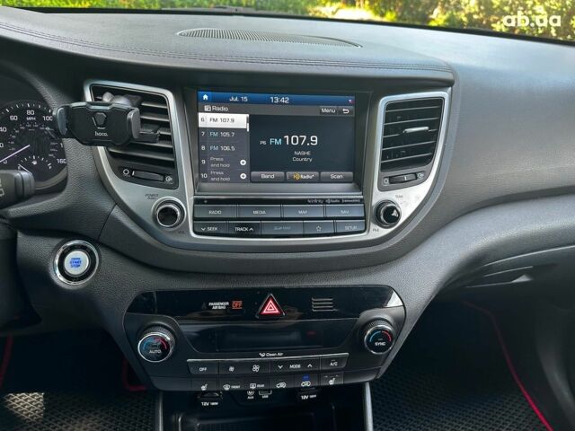 Черный Хендай Туксон, объемом двигателя 2 л и пробегом 109 тыс. км за 18490 $, фото 14 на Automoto.ua