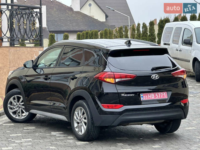Черный Хендай Туксон, объемом двигателя 2 л и пробегом 156 тыс. км за 12800 $, фото 20 на Automoto.ua