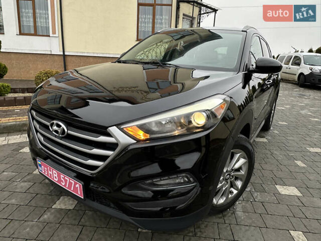 Черный Хендай Туксон, объемом двигателя 2 л и пробегом 156 тыс. км за 12800 $, фото 10 на Automoto.ua