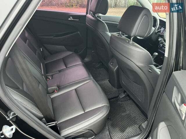 Черный Хендай Туксон, объемом двигателя 1.69 л и пробегом 134 тыс. км за 21800 $, фото 29 на Automoto.ua