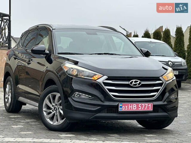 Черный Хендай Туксон, объемом двигателя 2 л и пробегом 156 тыс. км за 12800 $, фото 40 на Automoto.ua