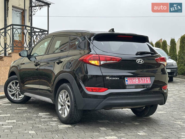 Черный Хендай Туксон, объемом двигателя 2 л и пробегом 156 тыс. км за 12800 $, фото 22 на Automoto.ua