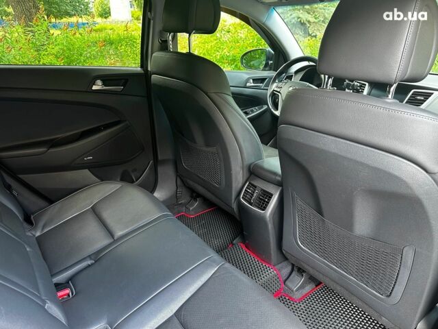 Черный Хендай Туксон, объемом двигателя 2 л и пробегом 109 тыс. км за 18490 $, фото 23 на Automoto.ua