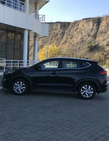 Черный Хендай Туксон, объемом двигателя 2 л и пробегом 62 тыс. км за 22500 $, фото 1 на Automoto.ua