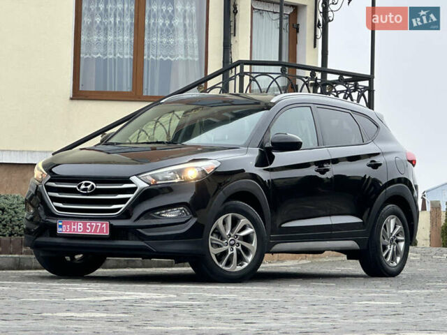 Черный Хендай Туксон, объемом двигателя 2 л и пробегом 156 тыс. км за 12800 $, фото 16 на Automoto.ua
