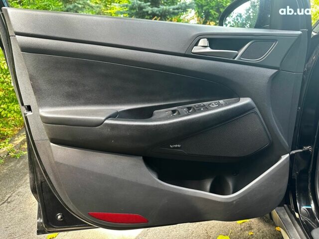 Черный Хендай Туксон, объемом двигателя 2 л и пробегом 109 тыс. км за 18490 $, фото 8 на Automoto.ua