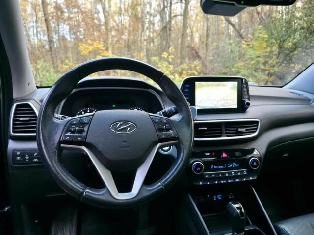 Чорний Хендай Туксон, об'ємом двигуна 2 л та пробігом 135 тис. км за 13500 $, фото 10 на Automoto.ua