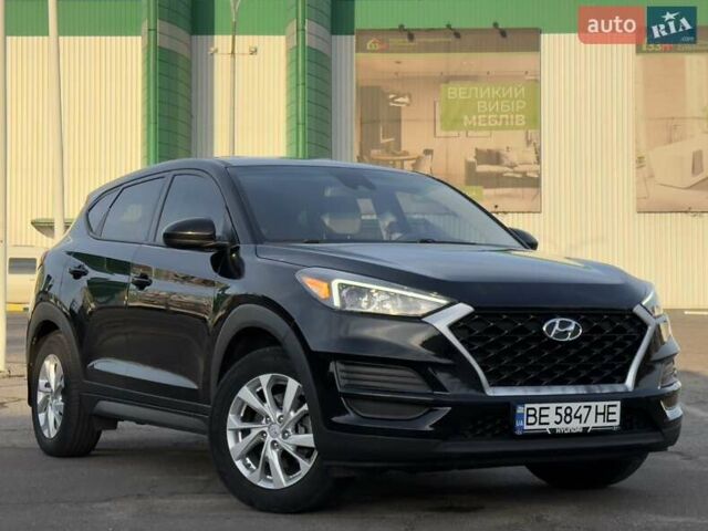 Черный Хендай Туксон, объемом двигателя 2 л и пробегом 127 тыс. км за 18900 $, фото 2 на Automoto.ua