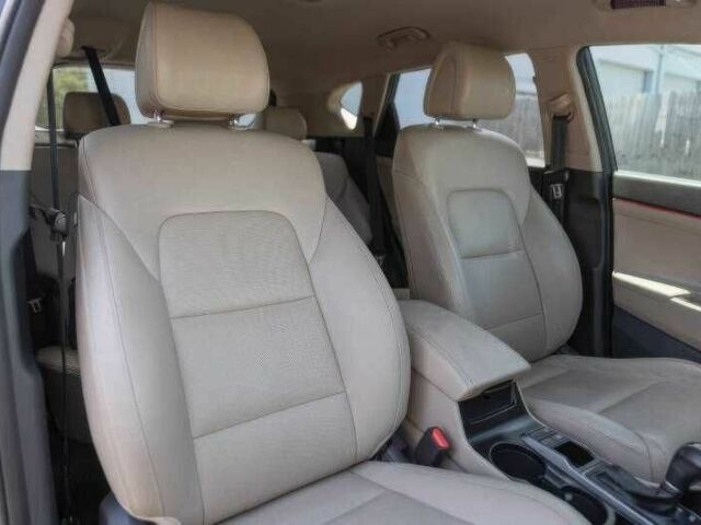 Черный Хендай Туксон, объемом двигателя 2 л и пробегом 89 тыс. км за 11200 $, фото 5 на Automoto.ua