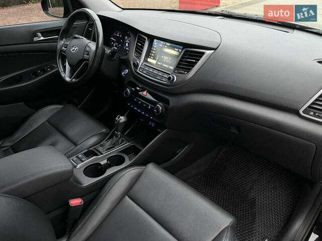 Черный Хендай Туксон, объемом двигателя 1.69 л и пробегом 134 тыс. км за 21800 $, фото 26 на Automoto.ua