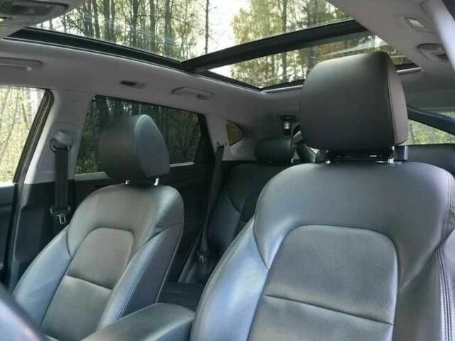 Чорний Хендай Туксон, об'ємом двигуна 2 л та пробігом 135 тис. км за 13500 $, фото 9 на Automoto.ua