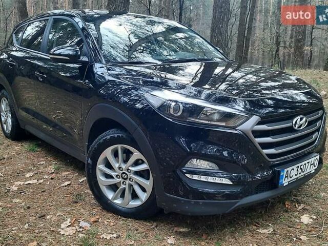 Черный Хендай Туксон, объемом двигателя 2 л и пробегом 100 тыс. км за 17200 $, фото 5 на Automoto.ua