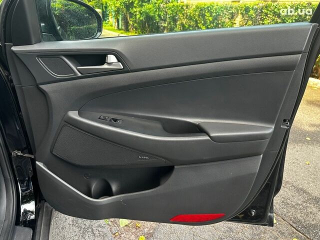 Черный Хендай Туксон, объемом двигателя 2 л и пробегом 109 тыс. км за 18490 $, фото 24 на Automoto.ua