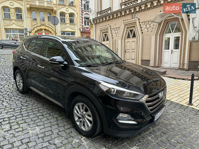 Черный Хендай Туксон, объемом двигателя 2 л и пробегом 100 тыс. км за 16900 $, фото 11 на Automoto.ua