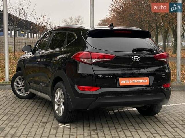 Черный Хендай Туксон, объемом двигателя 2 л и пробегом 106 тыс. км за 19500 $, фото 7 на Automoto.ua