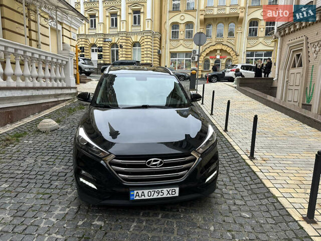 Черный Хендай Туксон, объемом двигателя 2 л и пробегом 100 тыс. км за 16900 $, фото 14 на Automoto.ua
