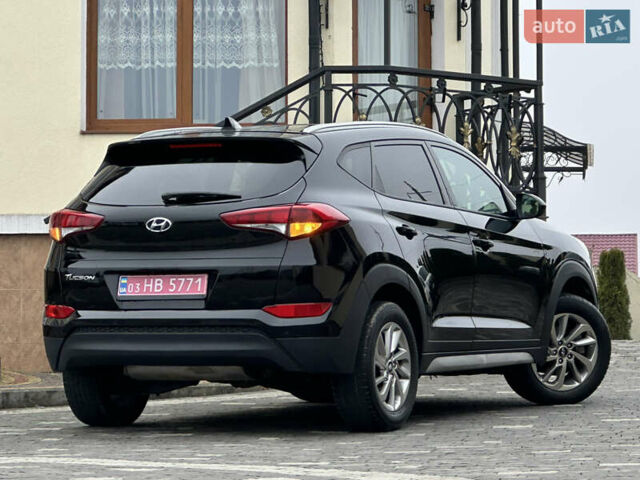 Черный Хендай Туксон, объемом двигателя 2 л и пробегом 156 тыс. км за 12800 $, фото 49 на Automoto.ua