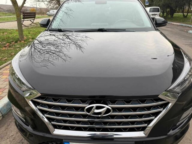 Чорний Хендай Туксон, об'ємом двигуна 2 л та пробігом 70 тис. км за 23000 $, фото 4 на Automoto.ua