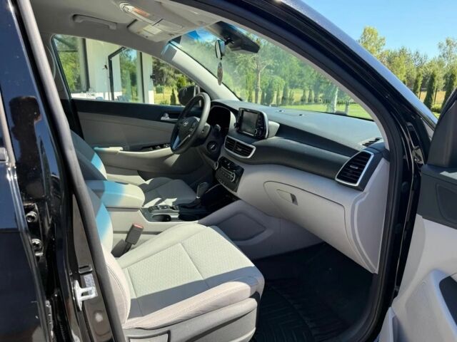 Черный Хендай Туксон, объемом двигателя 2 л и пробегом 80 тыс. км за 9500 $, фото 18 на Automoto.ua