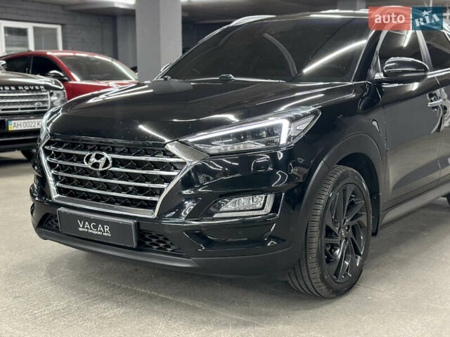 Черный Хендай Туксон, объемом двигателя 2 л и пробегом 153 тыс. км за 20500 $, фото 2 на Automoto.ua