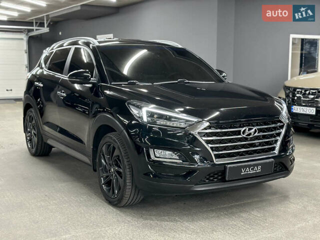 Черный Хендай Туксон, объемом двигателя 2 л и пробегом 153 тыс. км за 20500 $, фото 6 на Automoto.ua