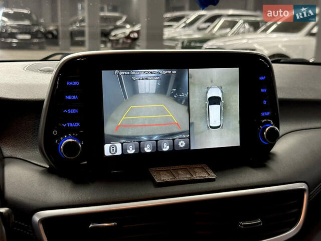 Черный Хендай Туксон, объемом двигателя 2 л и пробегом 153 тыс. км за 20500 $, фото 26 на Automoto.ua