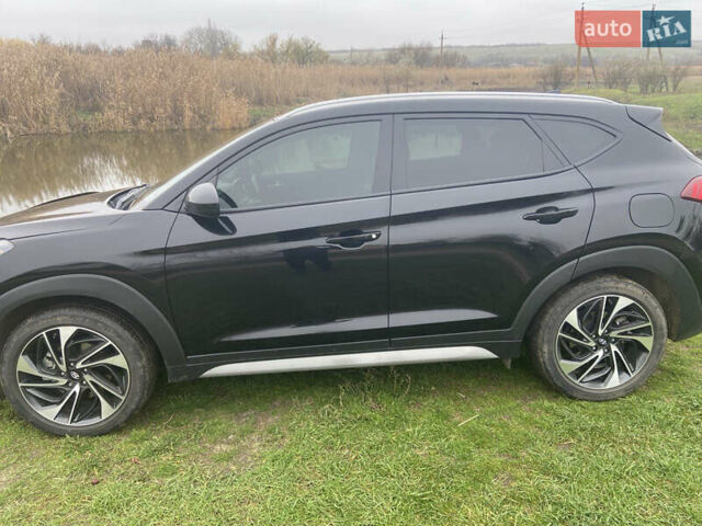 Черный Хендай Туксон, объемом двигателя 2.36 л и пробегом 68 тыс. км за 19000 $, фото 2 на Automoto.ua