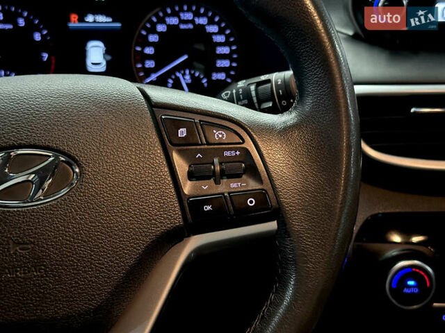 Черный Хендай Туксон, объемом двигателя 2 л и пробегом 153 тыс. км за 20500 $, фото 27 на Automoto.ua