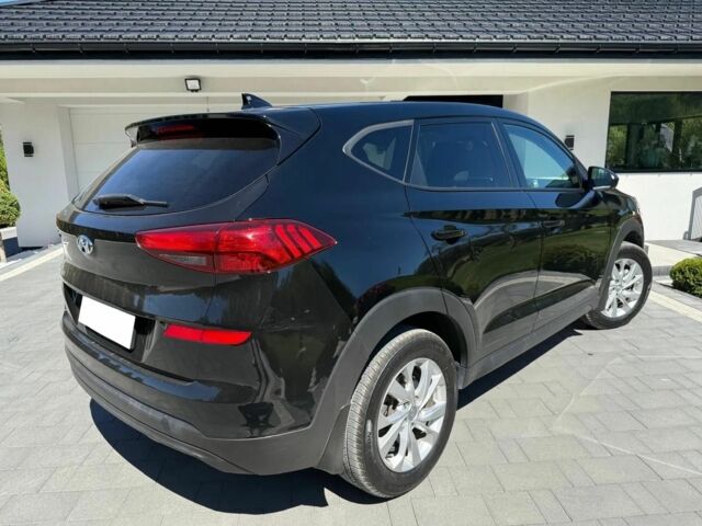 Черный Хендай Туксон, объемом двигателя 2 л и пробегом 80 тыс. км за 9500 $, фото 5 на Automoto.ua