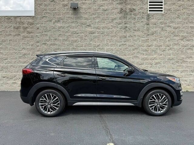 Черный Хендай Туксон, объемом двигателя 2.4 л и пробегом 42 тыс. км за 4100 $, фото 5 на Automoto.ua