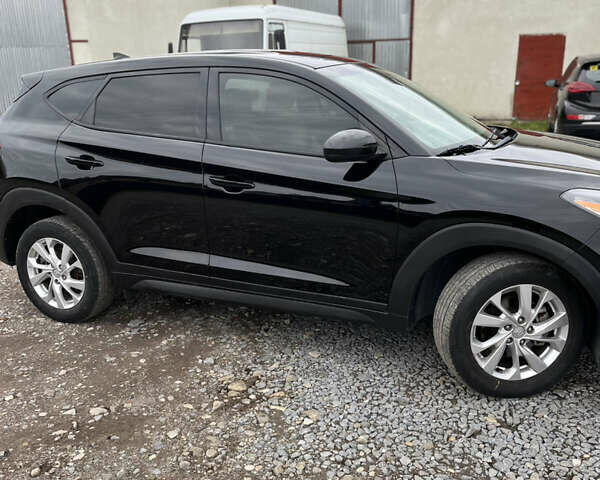 Черный Хендай Туксон, объемом двигателя 2 л и пробегом 192 тыс. км за 15200 $, фото 6 на Automoto.ua