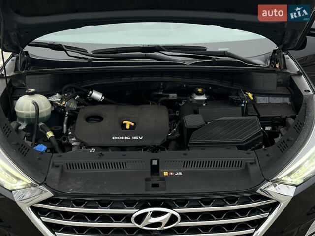 Чорний Хендай Туксон, об'ємом двигуна 2 л та пробігом 145 тис. км за 23900 $, фото 14 на Automoto.ua