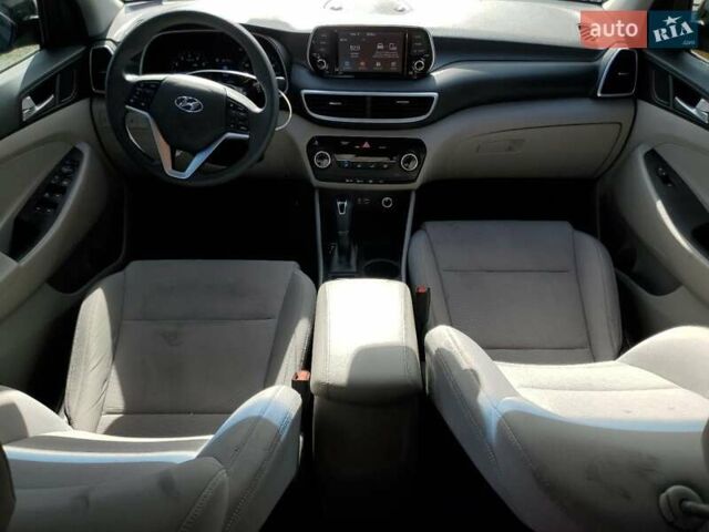 Черный Хендай Туксон, объемом двигателя 2 л и пробегом 108 тыс. км за 2800 $, фото 7 на Automoto.ua